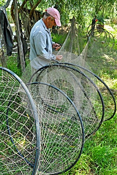Fisherman in the Danube delta, Romania