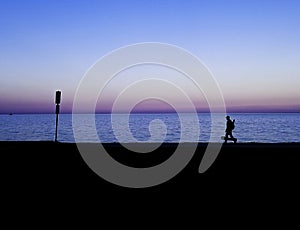 The fisherman at dusk in Chicago photo