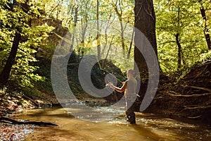 A fisherman fishing with fly fishing