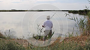 Fisherman fishing on a lake