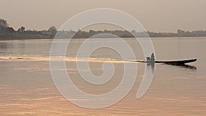 Fisherman fishing in Mekong River