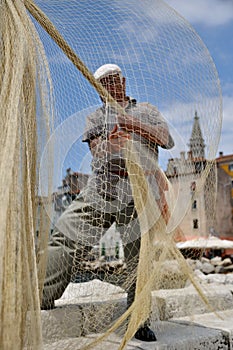 Fisherman and a fishing net