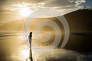 Fisherman with Fishing Rod Holder during Sunset at Wilderness Be