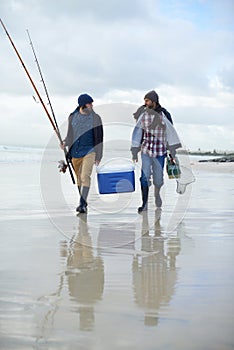 Fisherman, friends and walking on beach for fishing in the morning by sea with happiness, equipment or sky. Friendship