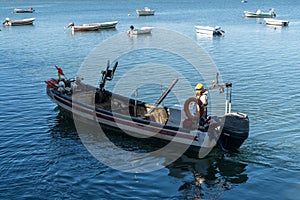 Fisherman on his boat during a working day