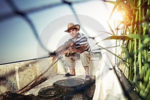 Fisherman holding a big carp