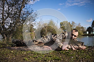 Fisherman holding a giant catfish.