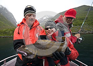 Fisherman holding Torsk