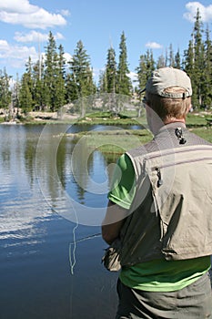 Fisherman and lake