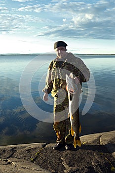 Fisherman with a large fish.