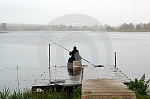 A fisherman monk with fishing rod