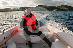 Fisherman in a motor boat