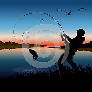 Fisherman and nature. Fisherman catches fish on a fishing rod photo