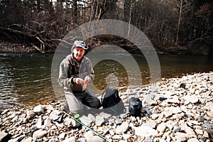 Fisherman preparing fishing gear for fishing