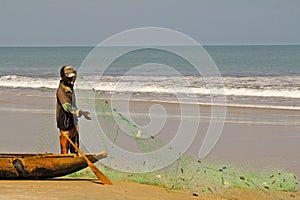 Fisherman pulling a fishing net