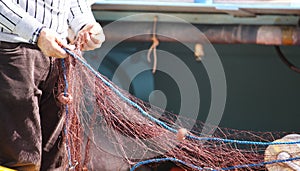 Fisherman pulling net