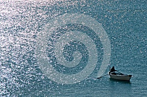 Fisherman rowing photo