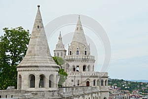 Fisherman`s Bastion and the statue of Stephen I. of Hungary and Matthias Church photo