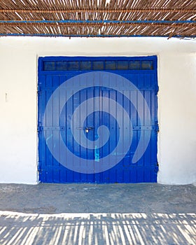 Fisherman's boat house blue door