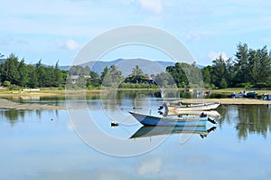 Fisherman's boat in a tranquil bay