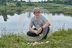 Fisherman`s catch - crucian and roach. Fishing on the lake. Recreation center. August 2021