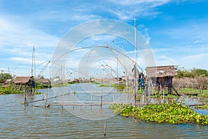 Fisherman`s village in Thailand with a number of fishing tools called