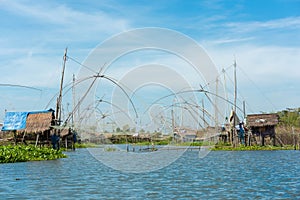 Fisherman`s village in Thailand with a number of fishing tools called