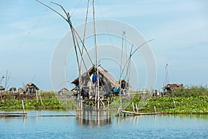 Fisherman`s village in Thailand with a number of fishing tools called `Yok Yor `, Thailand`s traditional fishing tools that made f