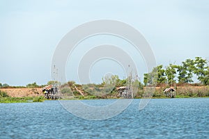 Fisherman`s village in Thailand with a number of fishing tools called `Yok Yor`, Thailand`s traditional fishing tools that made fo