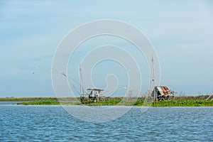 Fisherman`s village in Thailand with a number of fishing tools called `Yok Yor`, Thailand`s traditional fishing tools that made fo