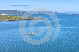 Fisherman sailing in the sea in Rogaland, Norway