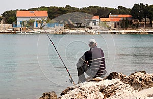 Fisherman at sea fishing