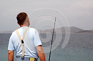 Fisherman at sea fishing