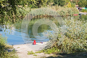 Fisherman seating and fishing