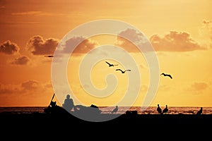 Fisherman silouhette at sunset