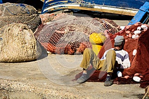 Fisherman sleeping in the harbor in Essaouira