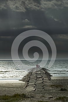 Fisherman on a Stone Pier