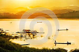 Fisherman in sunset background photo