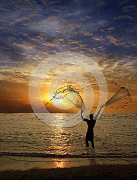 Fisherman throwing fishnet