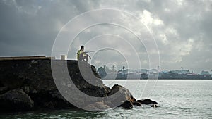 Fisherman on a wharf