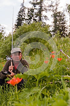 Fisherman. Where to go fishing? Tunguska river. photo