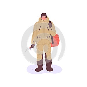 Fisherman in winter outfit ready for ice fishing in cold weather. Fisher man portrait. Angler in warm clothes stands