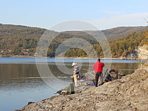 Fishermans on a lake