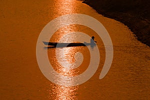 Fishermen in action when fishing in the lake.