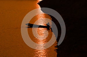 Fishermen in action when fishing in the lake.