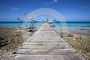 Fishermen boat on blue lagoon