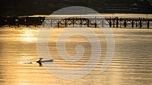 fishermen on boat at Mon bridge, Sangkhla buri