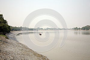 Fishermen on a boat in Sundarbans, India