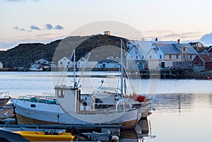 Fishermen boats near the pier photo