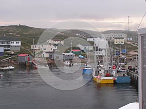 Fishermen boats and village